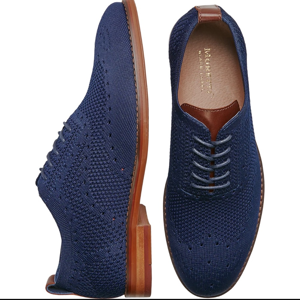 Moretti “Ashland”  shoes with trendy mesh top and red soles.